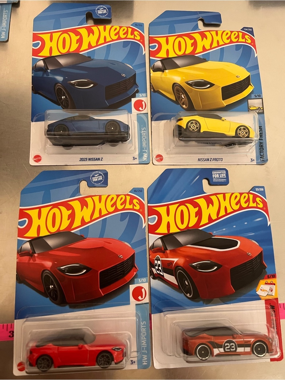 Hot Wheels 2023 Nissan Z Lot of 4 Blue Red Yellow Proto JDM Mainline